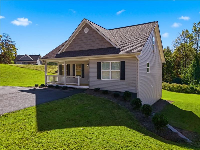 Front exterior of a new home in , Dahlonega, GA, highlighting curb appeal (Image 24).