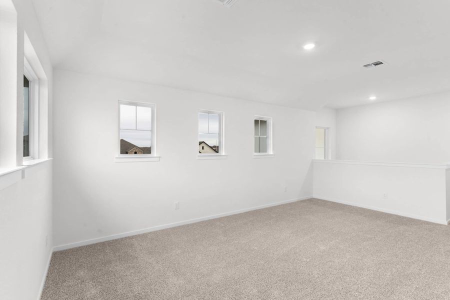 Spacious, unfurnished interior of a new home in Carillon, Manor (Image 16).