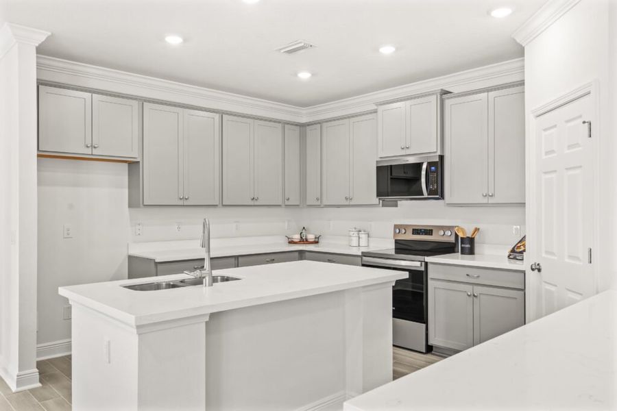 Furnished interior view inside a new home in Natureview, Freeport (Image 15).