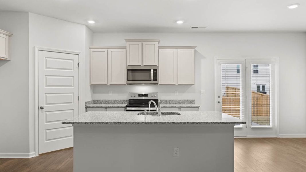 Representative furnished interior of a home built from the Sudbury by D.R. Horton in Laurel Park Townhomes, Hephzibah (Image 5).