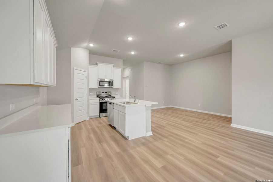 Furnished interior view inside a new home in Mesquite Ridge, San Antonio (Image 6).