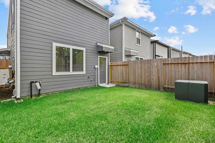 Exterior details and patio area of a home in , Houston (Image 3).