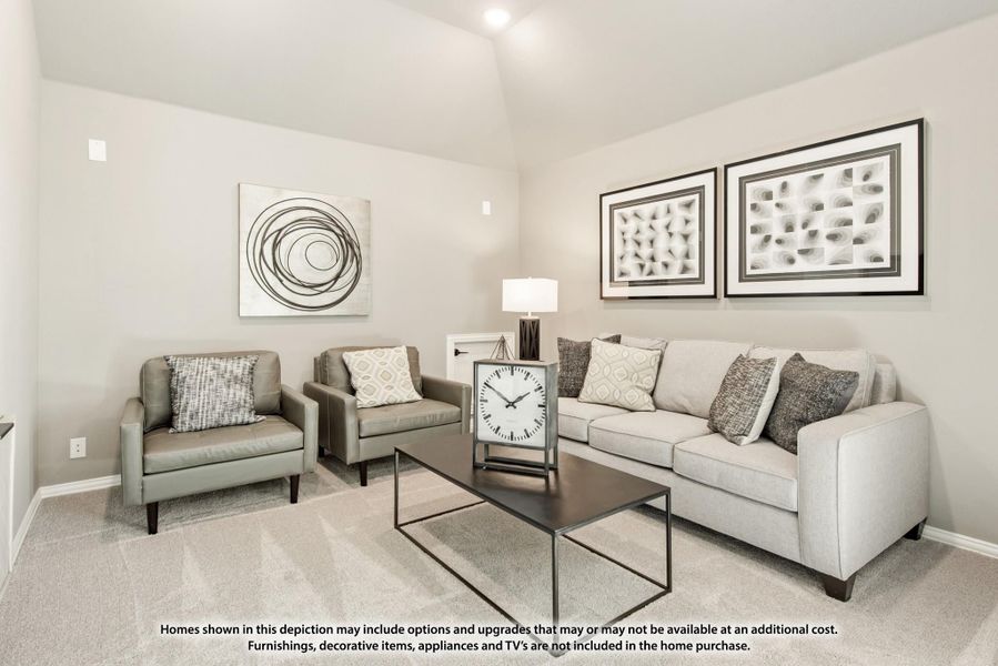 Living room with vaulted ceiling, gray sofa, two accent chairs, and dark coffee table on carpet flooring Living room with vaulted ceiling, gray sofa, two accent chairs, and dark coffee table on carpet flooring