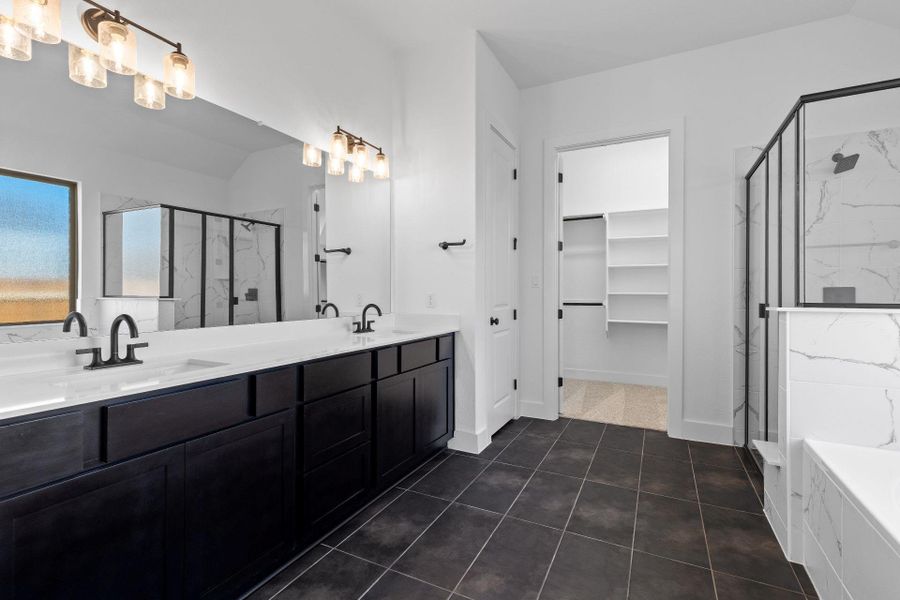 Primary Bath retreat with dual vanities, garden tub & walk-on shower Primary Bath retreat with dual vanities, garden tub & walk-on shower