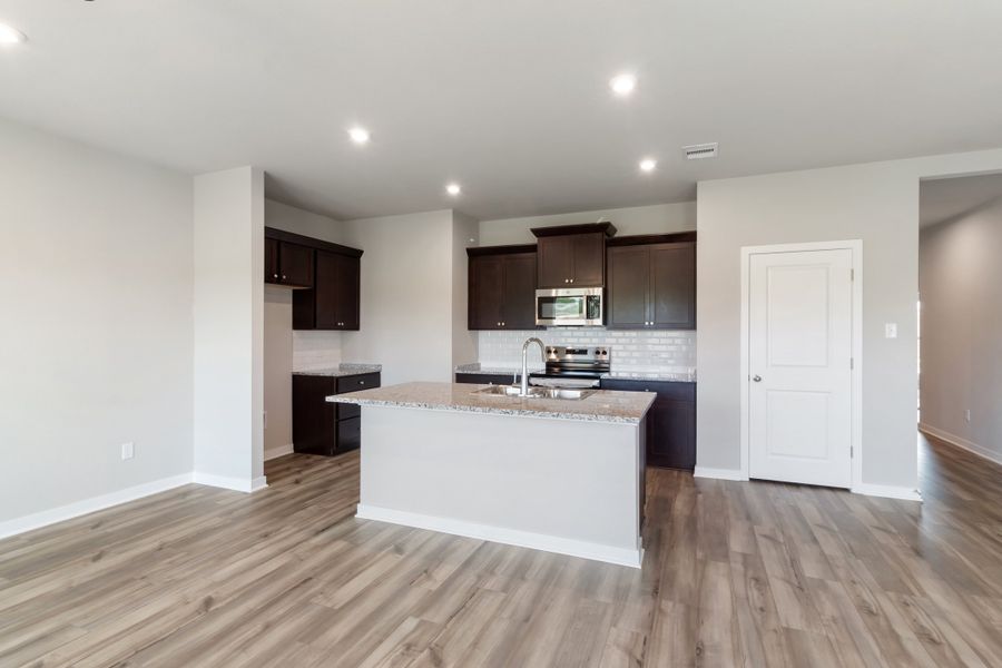 Representative furnished interior of a home built from the Colorado by Omega Builders in Hillside Village, Temple (Image 8).