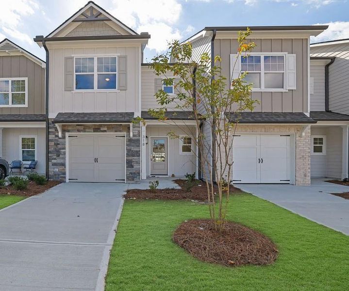 Front exterior of a new home in , Ball Ground, GA, highlighting curb appeal (Image 1). Front exterior of a new home in , Ball Ground, GA, highlighting curb appeal (Image 1).