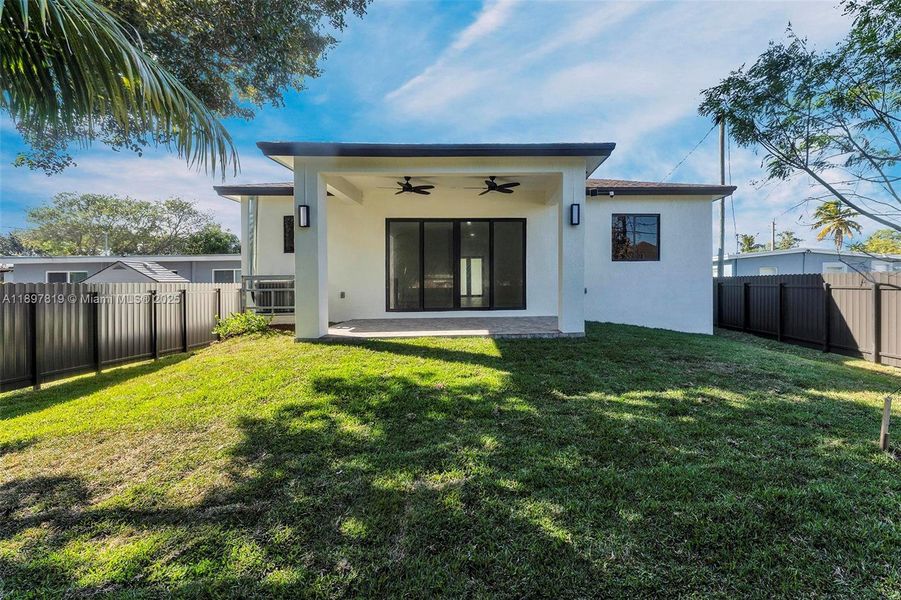 Exterior details and patio area of a home in , North Miami (Image 26).