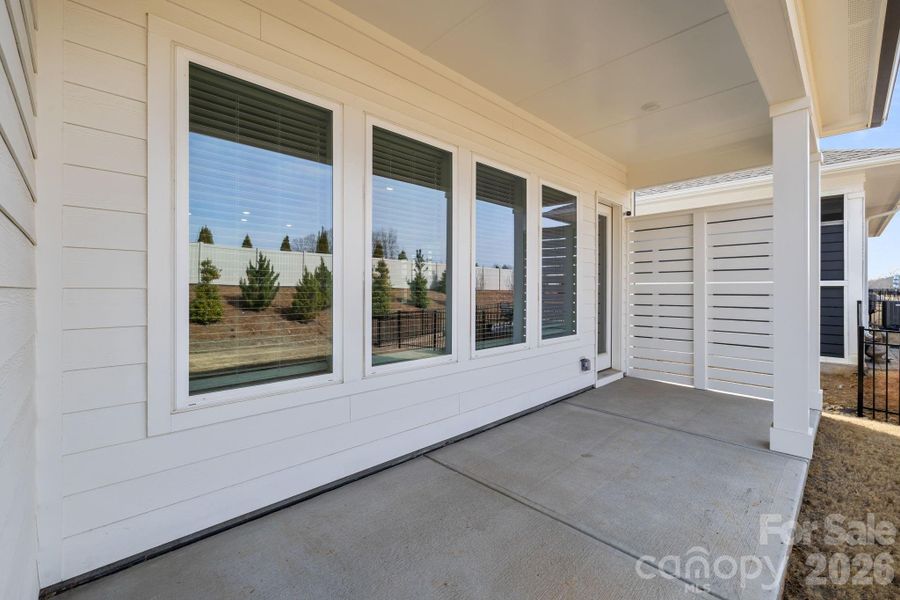 Exterior details and patio area of a home in Encore at Streamside - Classic Series, Waxhaw (Image 4).