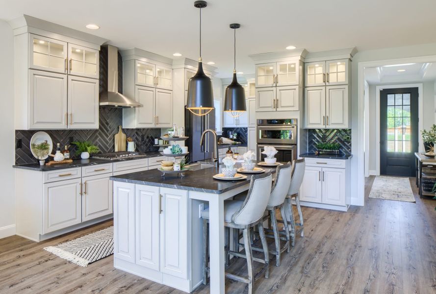 Representative furnished interior of a home built from the Manchester by Keystone Custom Homes in Preserve at Mayes Meadow, Cornelius (Image 3).