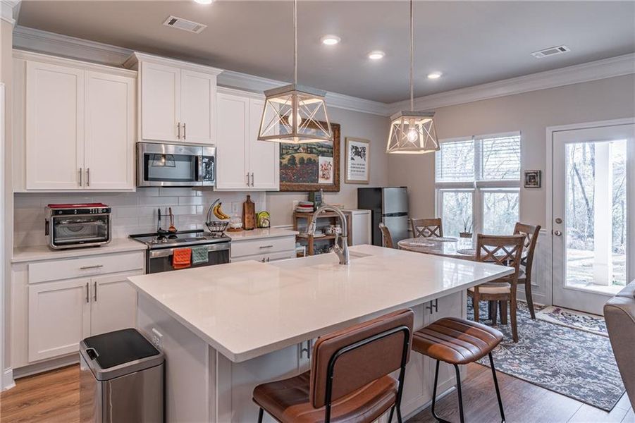 Furnished interior view inside a new home in Enclave at Brookside Crossing, Auburn (Image 9).