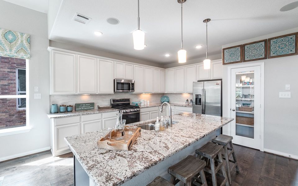 Representative furnished interior of a home built from the Snowmass by CastleRock Communities in Sanctuary, Salado (Image 9).