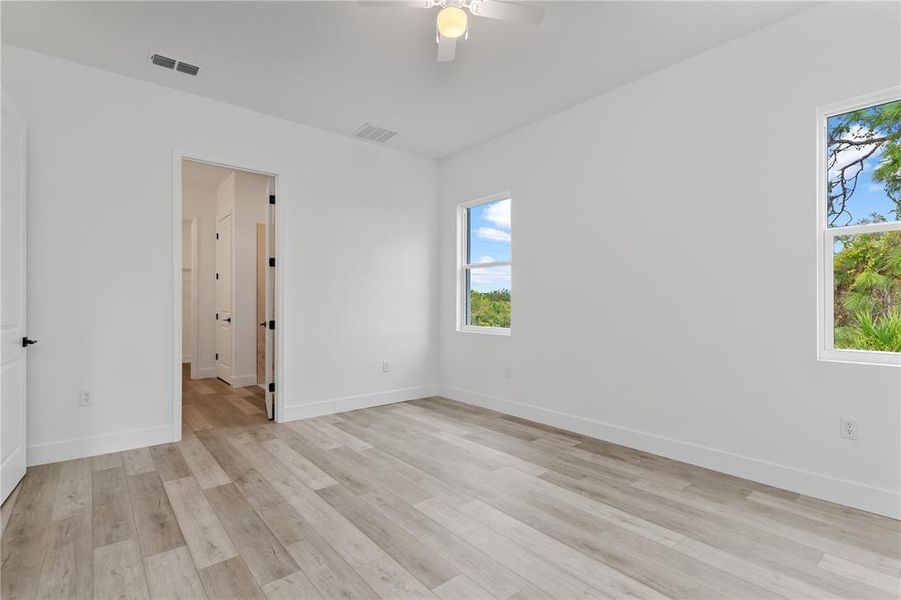 Spacious, unfurnished interior of a new home in , Port Charlotte (Image 35).