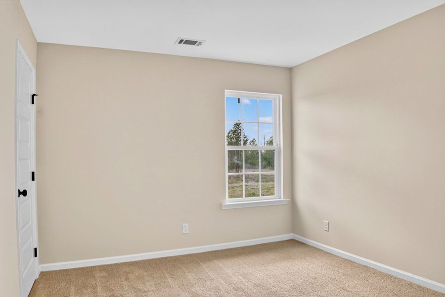 Representative unfurnished interior of a home built from the The Sunbury by RTS Homes in Doctor's Creek, Ludowici (Image 30).