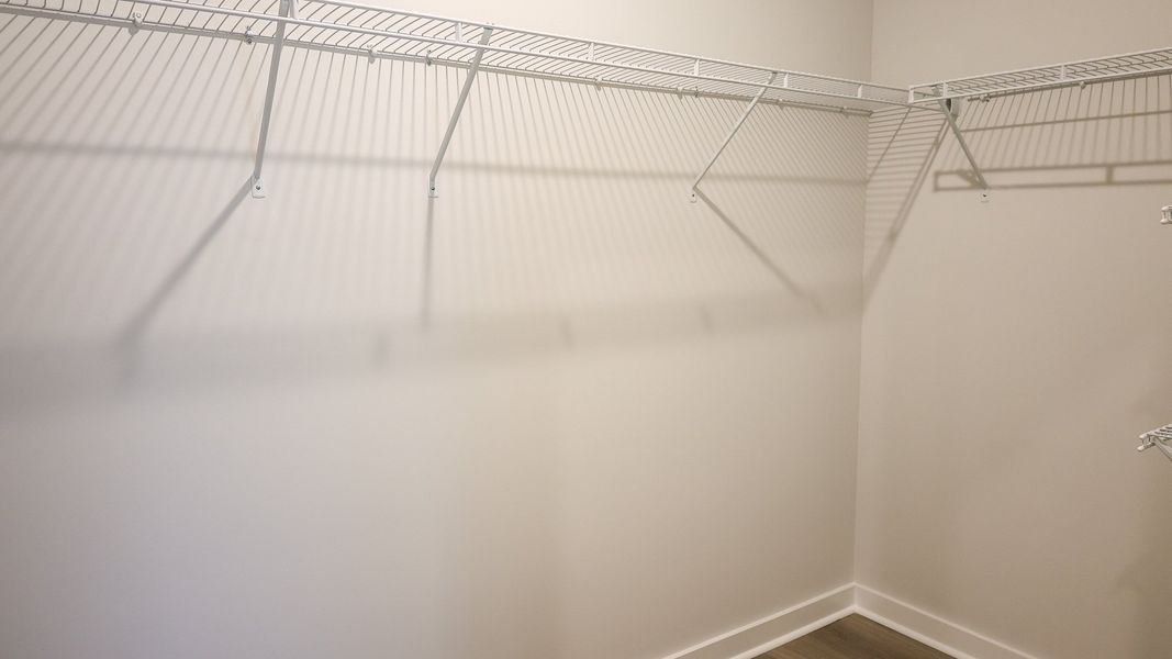 Representative unfurnished interior of a home built from the EMBRY by D.R. Horton in Harvest Point, Spring Hill (Image 36).