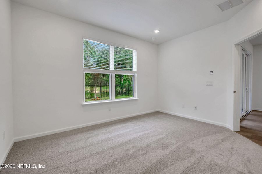 Spacious, unfurnished interior of a new home in The Hammock at Palm Harbor, Palm Coast (Image 36).