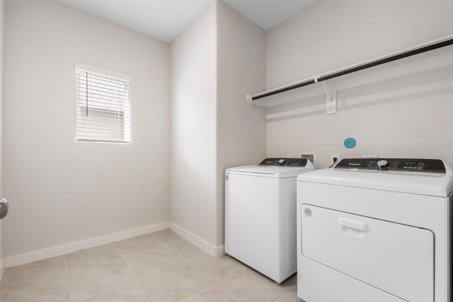 Oversized laundry room located on the first floor