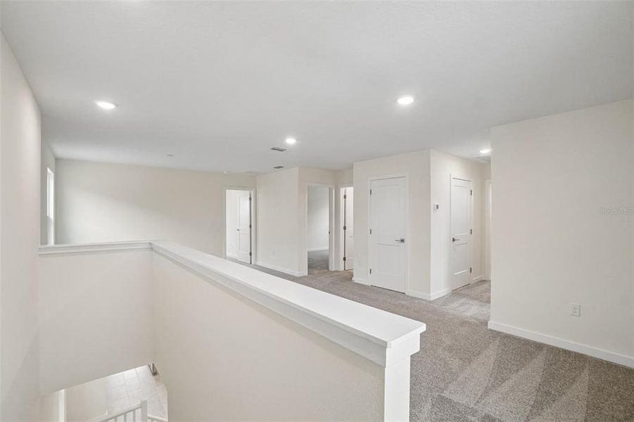 Spacious, unfurnished interior of a new home in Grasslands West, Lakeland (Image 26).