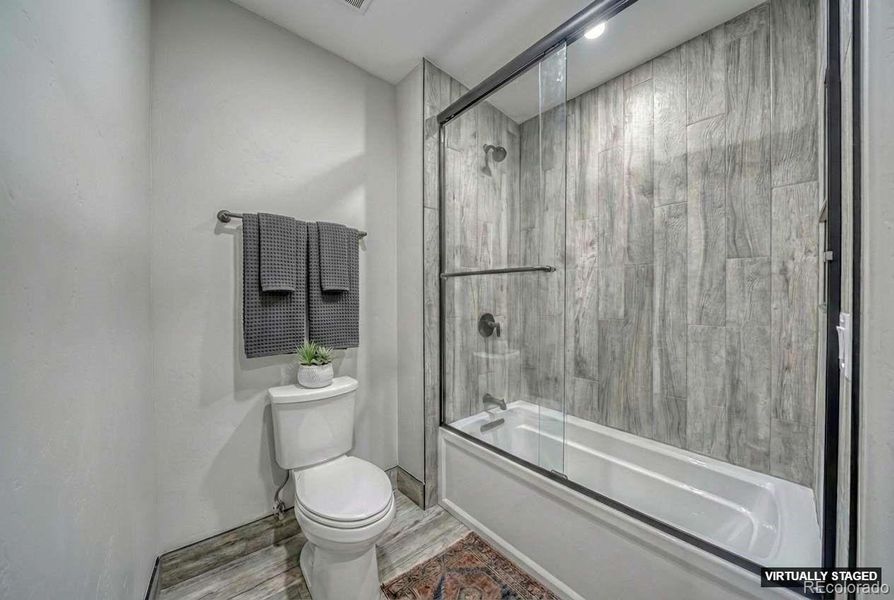 Primary bath and shower, virtually staged
