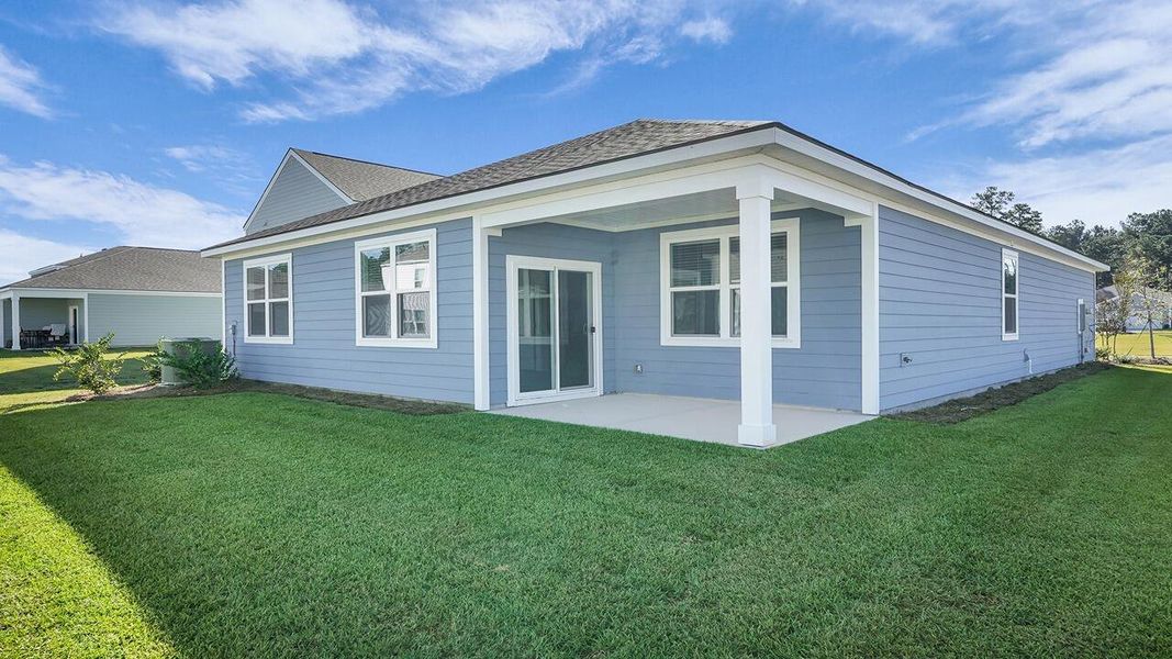 Exterior details and patio area of a home in Hillcrest, Ravenel (Image 2). Exterior details and patio area of a home in Hillcrest, Ravenel (Image 2).