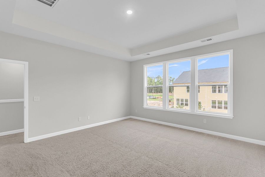 Spacious, unfurnished interior of a new home in Pineland Preserve, Summerville (Image 26).