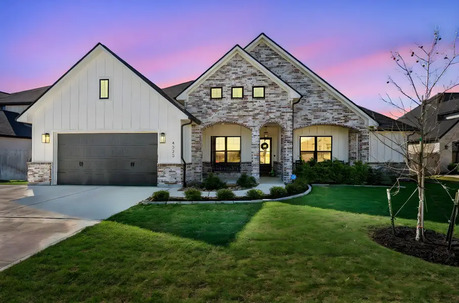 Front exterior of a new home in , College Station, TX, highlighting curb appeal (Image 1). Front exterior of a new home in , College Station, TX, highlighting curb appeal (Image 1).