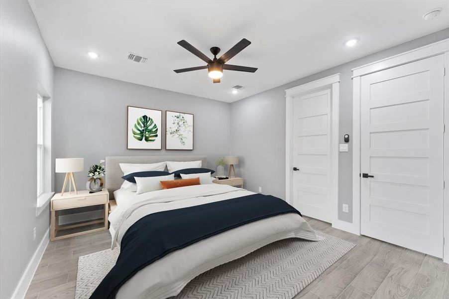 Primary bedrooms has a custom walk-in closet with built-in cabinetry.