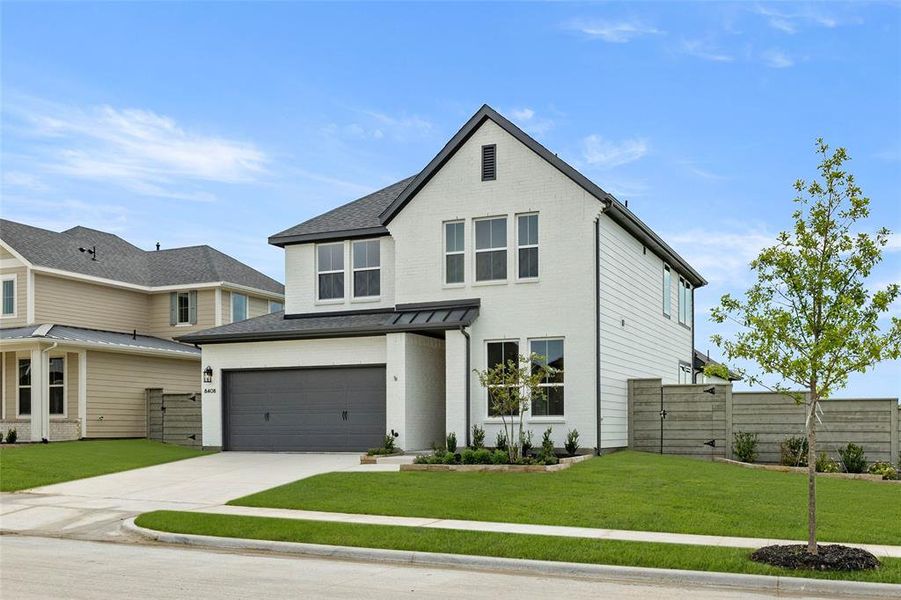 Front exterior of a new home in Treeline, Justin, TX, highlighting curb appeal (Image 16).