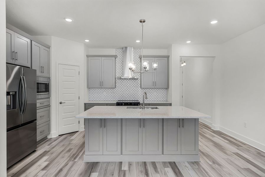 Representative furnished interior of a home built from the Newton by Rockwell Homes in Harvest at Ovation - Townhomes, Winter Garden (Image 15). Representative furnished interior of a home built from the Newton by Rockwell Homes in Harvest at Ovation - Townhomes, Winter Garden (Image 15).