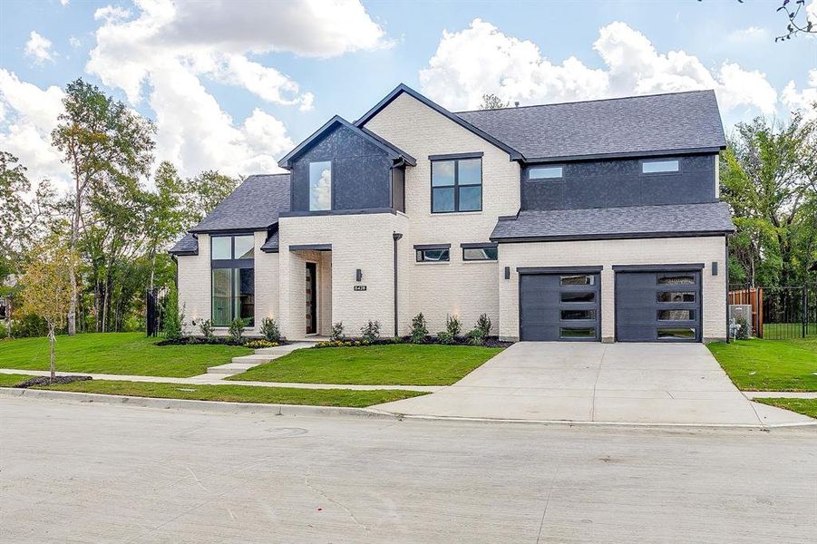 Front exterior of a new home in St. Joseph Estates, North Richland Hills, TX, highlighting curb appeal (Image 24).