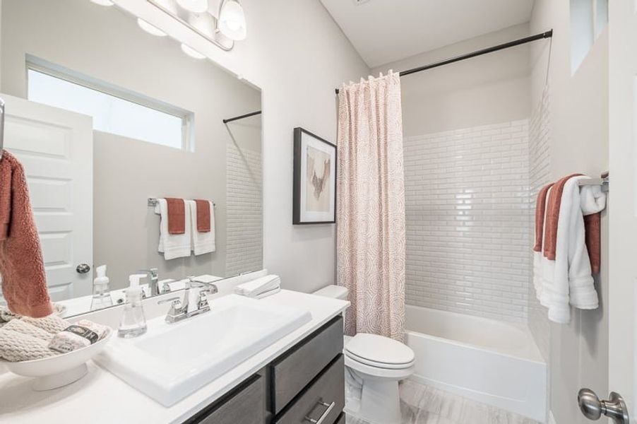 Furnished interior view inside a new home in Woodson’s Reserve 45′, Spring (Image 21).