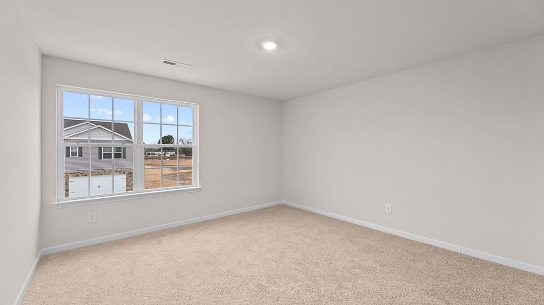 Spacious, unfurnished interior of a new home in Ridgewood Farms, Winterville (Image 23).