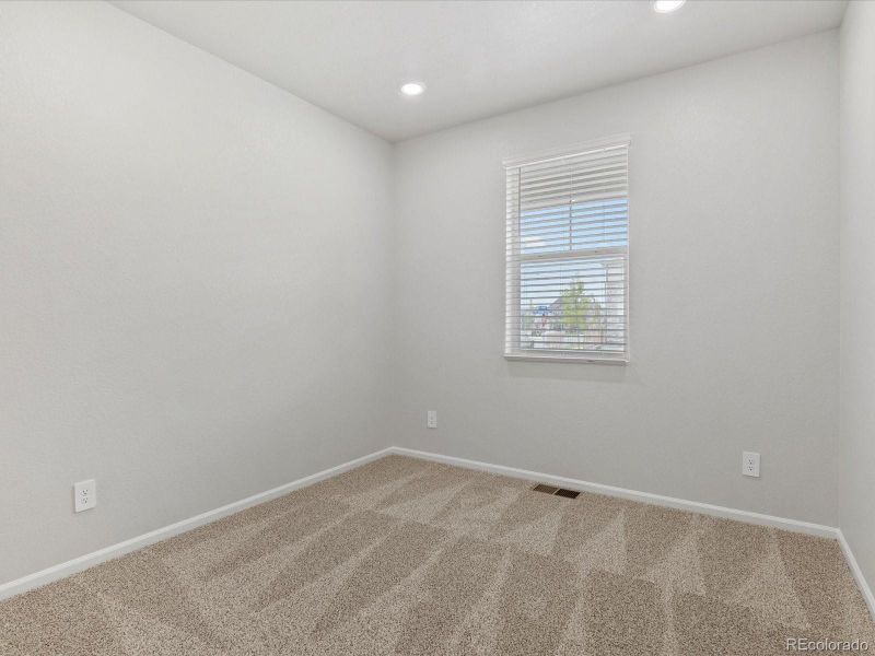 Spacious, unfurnished interior of a new home in Ridgeline Vista: The Flora Collection, Brighton (Image 23). Spacious, unfurnished interior of a new home in Ridgeline Vista: The Flora Collection, Brighton (Image 23).