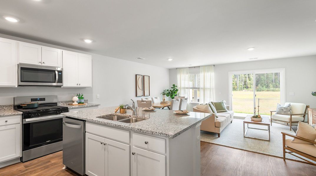 Furnished interior view inside a new home in Pine Hills Townhomes at Cane Bay, Summerville (Image 3).