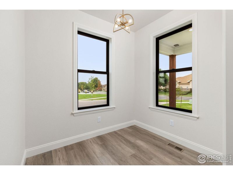 Spacious, unfurnished interior of a new home in Cottages at Kelly Farm, Greeley (Image 33).
