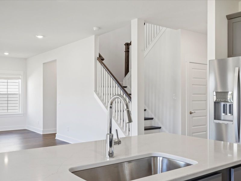 Furnished interior view inside a new home in The Coves at Lakes of Cane Bay, Summerville (Image 8).