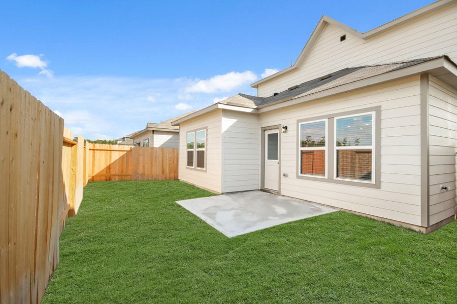 Exterior details and patio area of a home in Northpark South, Porter (Image 3). Exterior details and patio area of a home in Northpark South, Porter (Image 3).