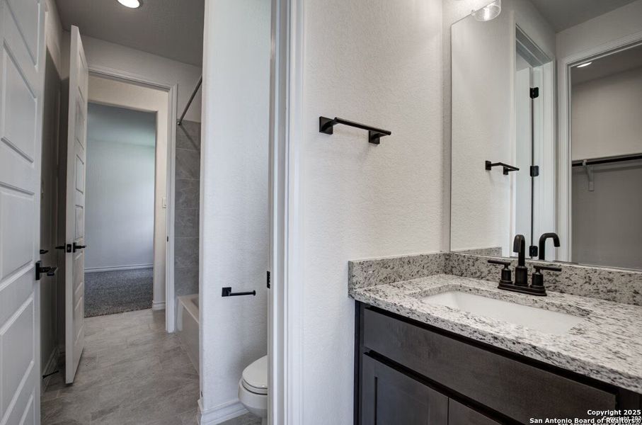 Furnished interior view inside a new home in The Reserve at Potranco Oaks, Castroville (Image 20).