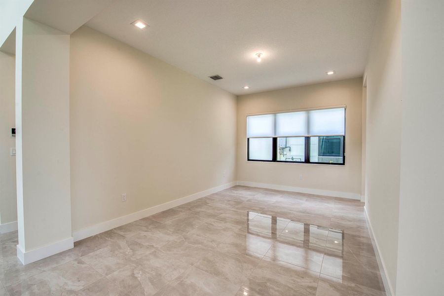 Furnished interior view inside a new home in Apex at Avenir, Palm Beach Gardens (Image 27).