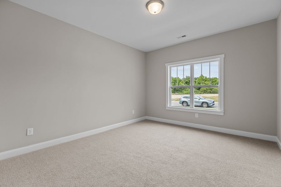 Representative unfurnished interior of a home built from the Haddock by Bill Clark Homes in Laurel Oaks, Greenville (Image 37).