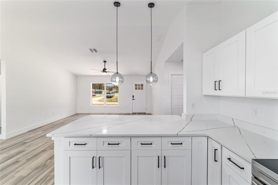 Furnished interior view inside a new home in , Dunnellon (Image 13).