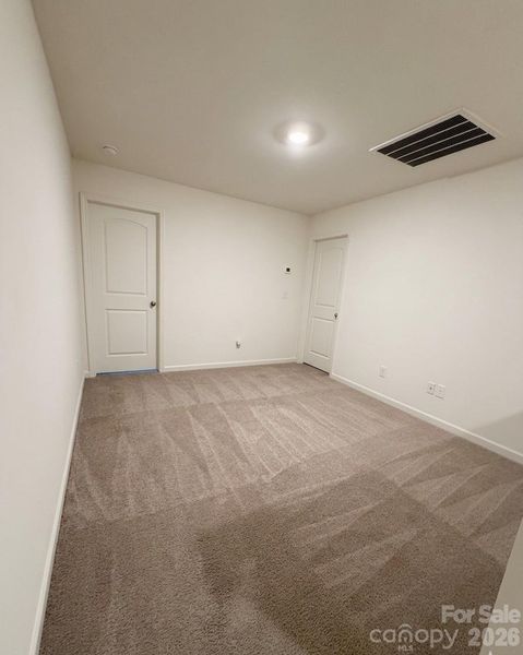 Spacious, unfurnished interior of a new home in Wilkerson Place, York (Image 31).