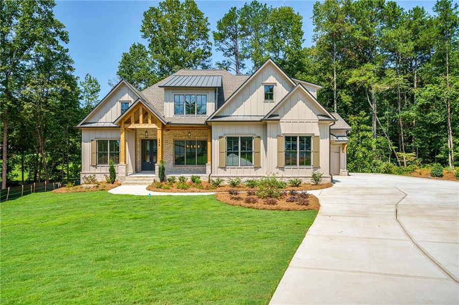 Front exterior of a new home in Malone's Pond, Ball Ground, GA, highlighting curb appeal (Image 28).