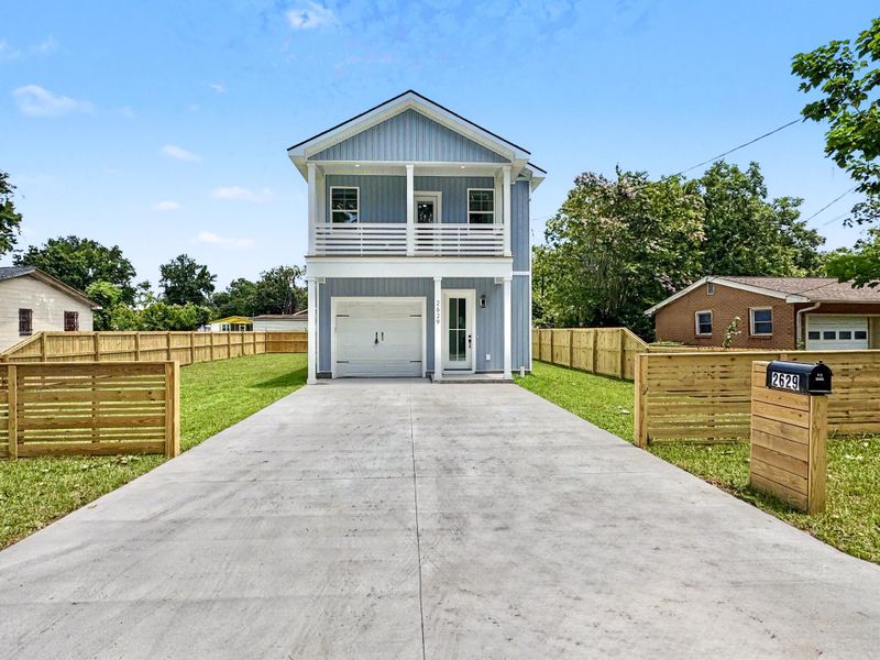 Front exterior of a new home in , North Charleston, SC, highlighting curb appeal (Image 1). Front exterior of a new home in , North Charleston, SC, highlighting curb appeal (Image 1).