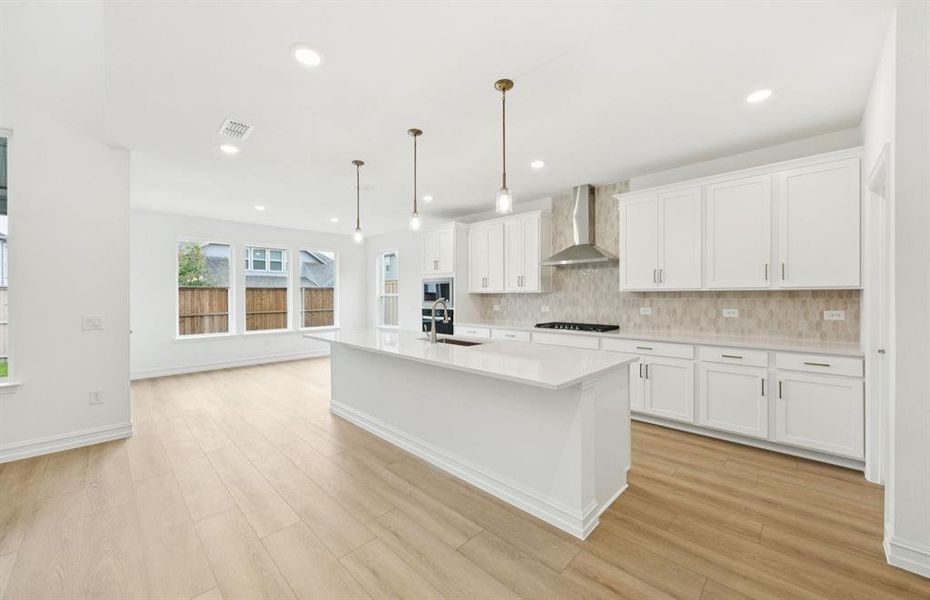 *floorplan representation, not actual home - Large island overlooking gathering room and dining areas
