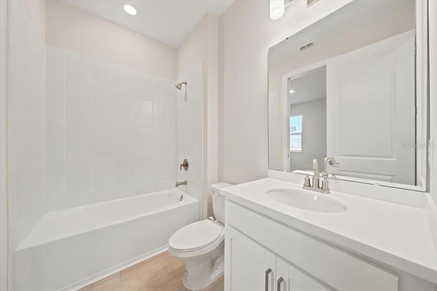 Furnished interior view inside a new home in Coasterra Community Group Page, Palmetto (Image 28).