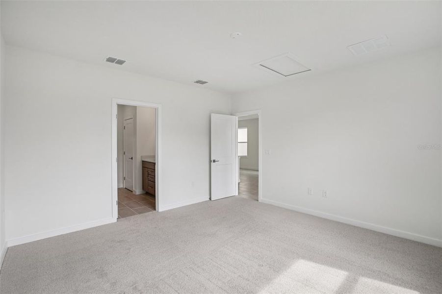Spacious, unfurnished interior of a new home in Grasslands West, Lakeland (Image 29).