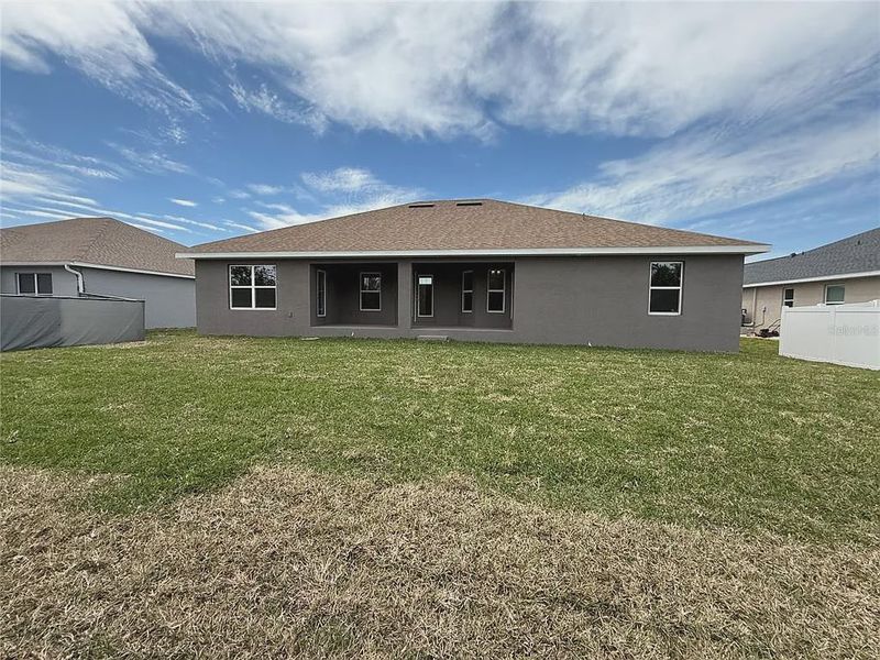 Front exterior of a new home in South Gulf Cove, Port Charlotte, FL, highlighting curb appeal (Image 2). Front exterior of a new home in South Gulf Cove, Port Charlotte, FL, highlighting curb appeal (Image 2).