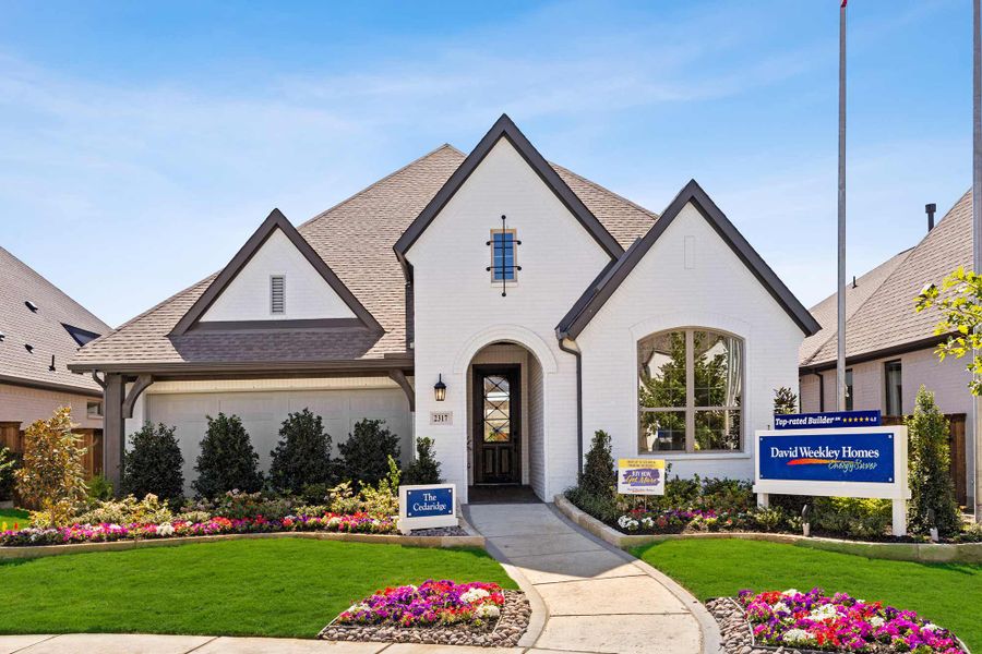 Representative exterior photo of a completed home built from the The Cedaridge by David Weekley Homes in Mustang Lakes, Celina, TX (Image 1).