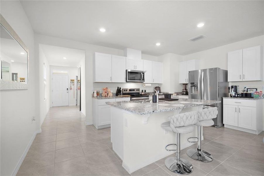 Furnished interior view inside a new home in Kindred, Kissimmee (Image 9).