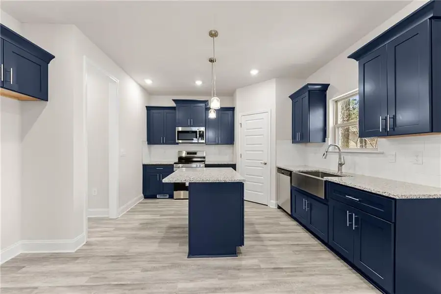 Furnished interior view inside a new home in Magnolia Villas, Cornelia (Image 8).